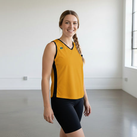 Pivotstar white sport fit jersey with black side panels and v-neck, worn by a woman in black shorts.