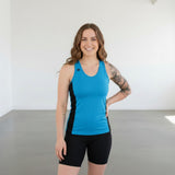 Pivotstar yellow and black athletic tank top with racerback and fitted silhouette. Made from quick-dry, wicking material.